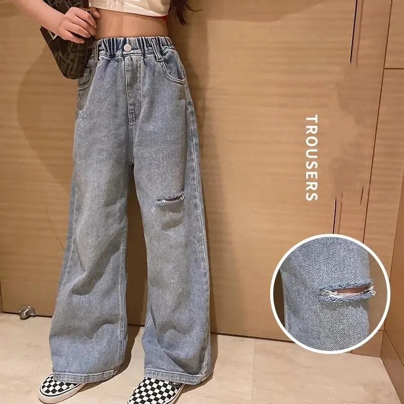 Dievčenské džínsy, kórejská verzia, roztrhané ležérne nohavice, dievčenská móda v západnom štýle, široké nohavice, jarné a jesenné detské roztrhané džínsy