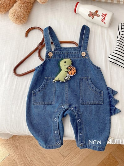 2023 Kórejské batoľacie dievčatká Jarné jesenné džínsy Nášivky s kreslenými hračkami Voľné traky s vreckámi Bavlnené džínsové nohavice pre dojčatá