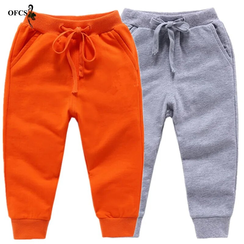 Nouă vânzare cu amănuntul Pantaloni din bumbac uni Băieți Fete Pantaloni sport casual Jogging Enfant Garcon Copii Pantaloni copii Unisex 2-10 ani