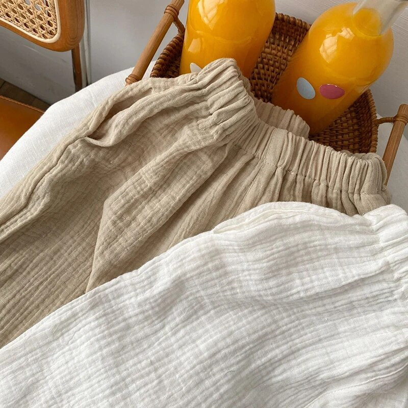 Detské nohavice zo 100% bavlny s dvojitou gázou, jar/leto, nové chlapčenské a dievčenské, ležérne japonské jednofarebné nohavice, detské bloomers WTP110