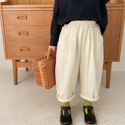 Korea stiilis kevadised poiste ja tüdrukute soliidsed vabaaja püksid unisex mood vabad püksid lasteriiete jaoks