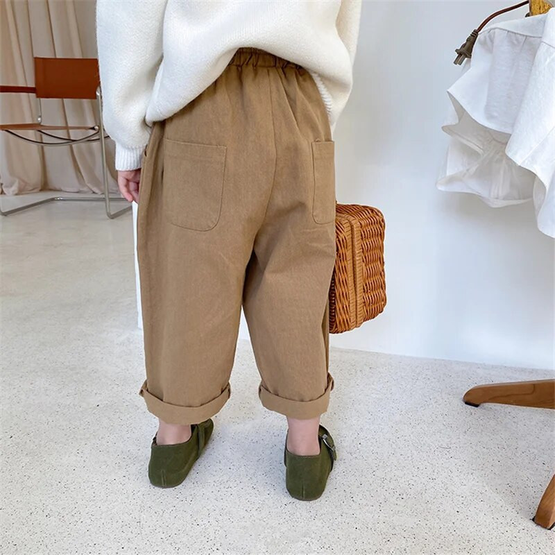 Korea stiilis kevadised poiste ja tüdrukute soliidsed vabaaja püksid unisex mood vabad püksid lasteriiete jaoks