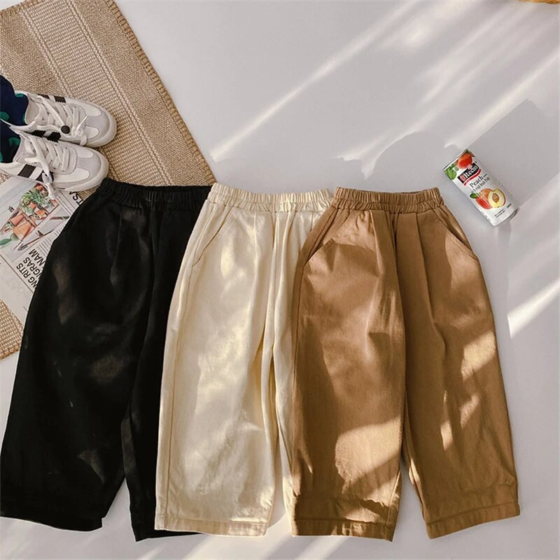 Korea stiilis kevadised poiste ja tüdrukute soliidsed vabaaja püksid unisex mood vabad püksid lasteriiete jaoks