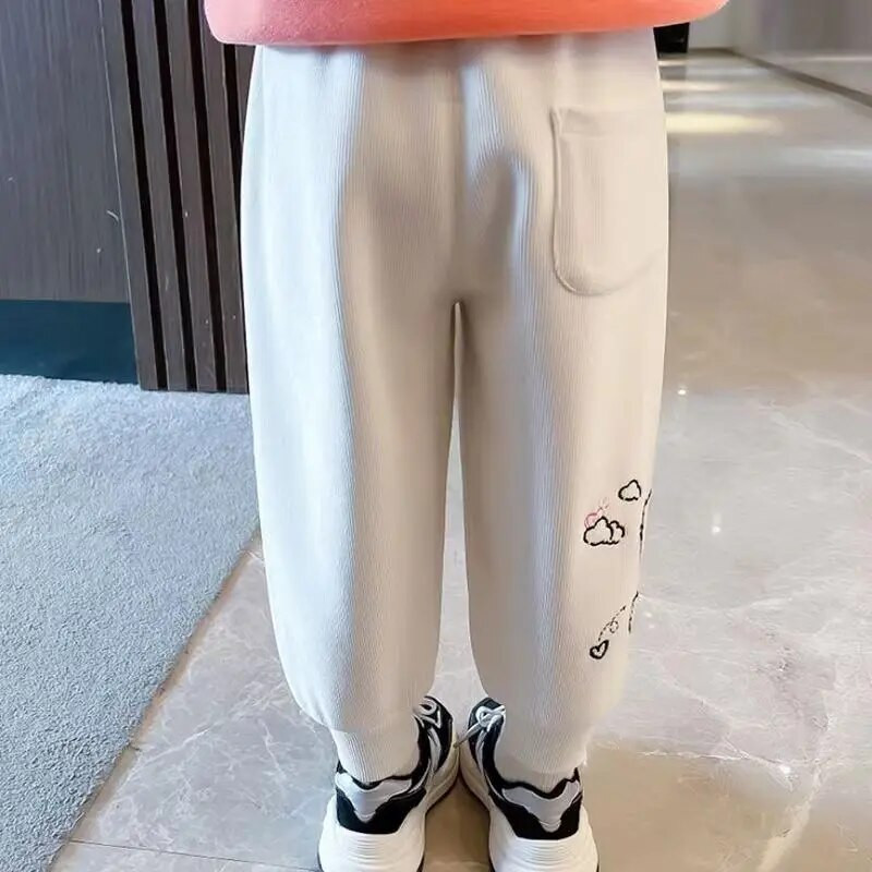 Tüdrukute sügistalvised püksid uued pluss samettrükiga multifilmipüksid Korea vabaaja laste komposiitmaterjalist integreeritud kuhjaga dressipüksid