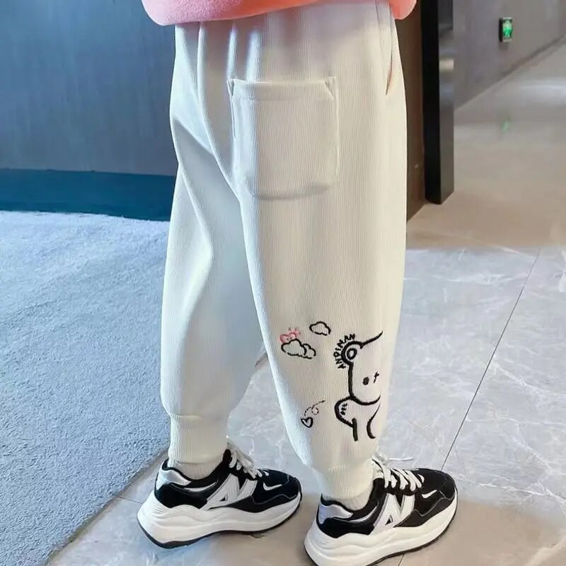 Tüdrukute sügistalvised püksid uued pluss samettrükiga multifilmipüksid Korea vabaaja laste komposiitmaterjalist integreeritud kuhjaga dressipüksid