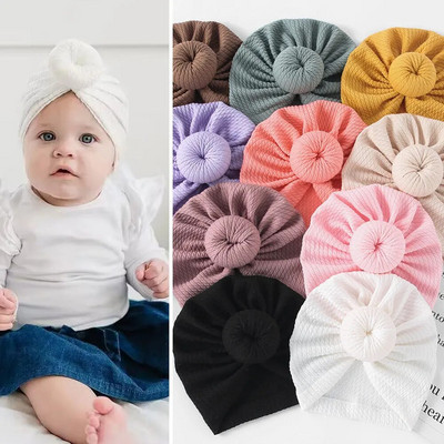 Прекрасна плетена бебешка шапка с поничка Сладка едноцветна шапка за бебета, момичета, момчета, тюрбан, мека шапка за новородено бебе, плетене на шапки, шапки за глава