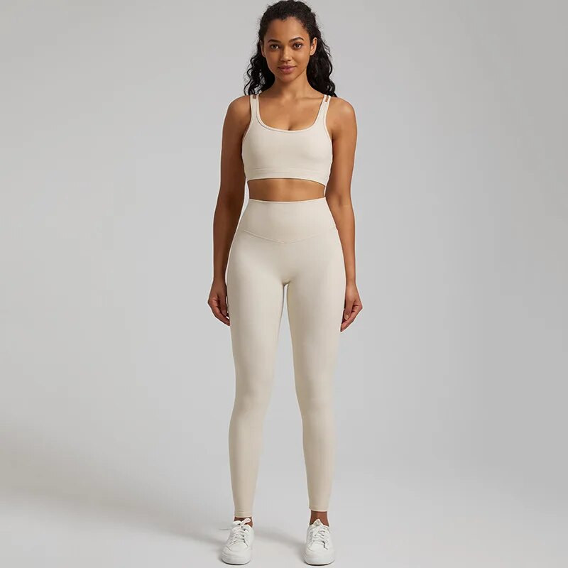 Jedna boja Gym Fitness Yoga Set Legging Back Cross Sport Grudnjak Top 2pc Odijelo Comprehensive Training Jog Ženski izrezana kravata Okrugli ovratnik