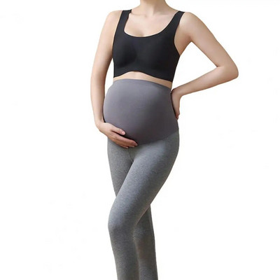 Támogató kismama sport nadrágok Stílusos leggings magas derekú vékony nadrág terhes nők számára, hastartással kényelmes