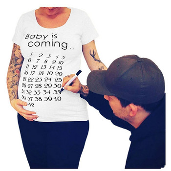 Baby Is Coming Ημερολόγιο Μπλουζάκι εγκυμοσύνης Ρούχα Έγκυος Επιστολή Εκτύπωση Baby Is Coming Έγκυες Μπλούζες Μπλούζες με κοντομάνικα