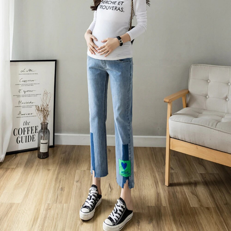 Iš šono suskaldytas džinsas motinystės tiesūs ilgi džinsai plačiomis kojomis laisvos kelnės Drabužiai nėščiosioms Prašmatnus nėštumas Moteriškas kūnas