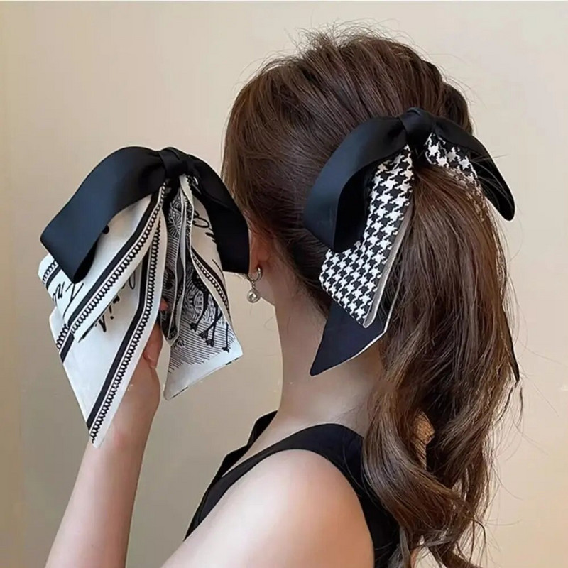 Bowknot masni banán csíptető aranyos koreai stílusú szalagos haj karmos függőleges klip lófarok tartó