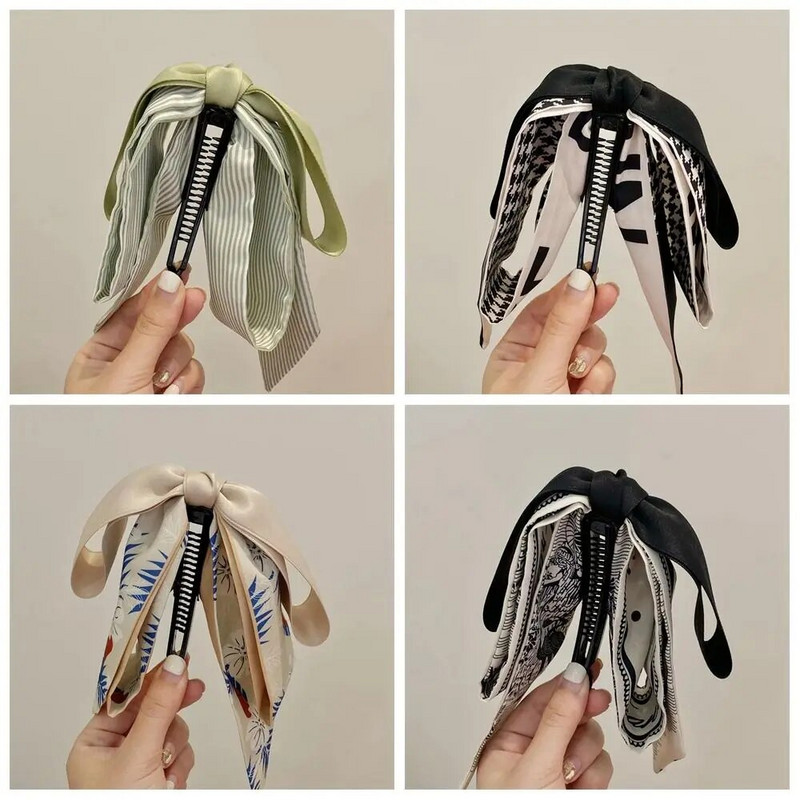 Bowknot masni banán csíptető aranyos koreai stílusú szalagos haj karmos függőleges klip lófarok tartó