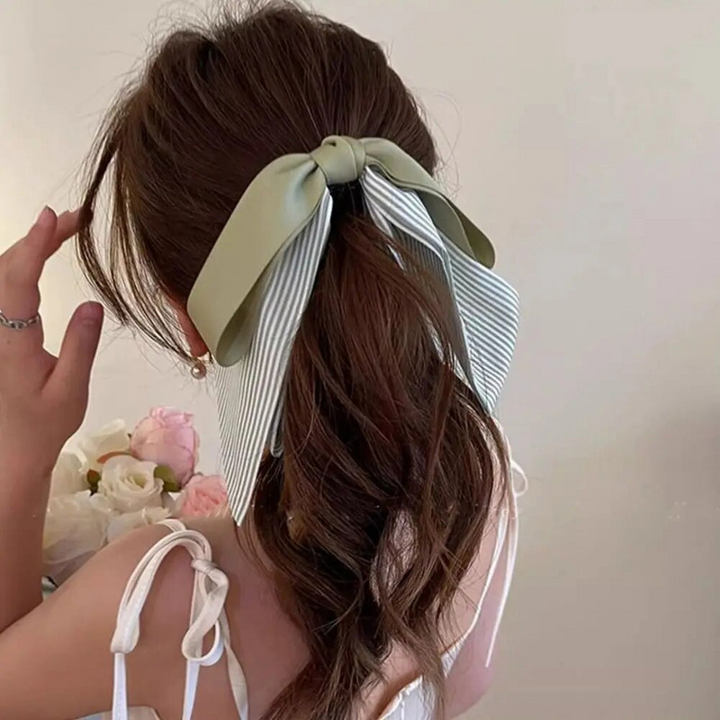 Bowknot masni banán csíptető aranyos koreai stílusú szalagos haj karmos függőleges klip lófarok tartó