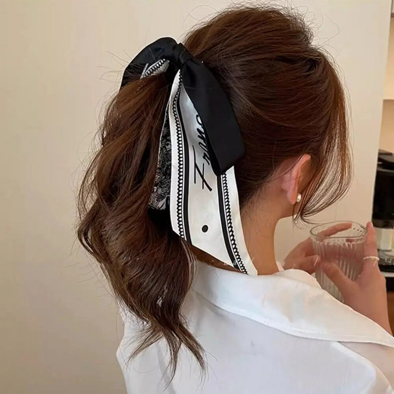Bowknot masni banán csíptető aranyos koreai stílusú szalagos haj karmos függőleges klip lófarok tartó