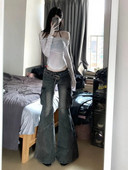 Vintažiniai mažo aukščio, mikro nuskurę džinsai, skalbiami krovininės kelnės moteriškos Y2K tendencijos platėjančios pasagos kelnės gatvės drabužiai