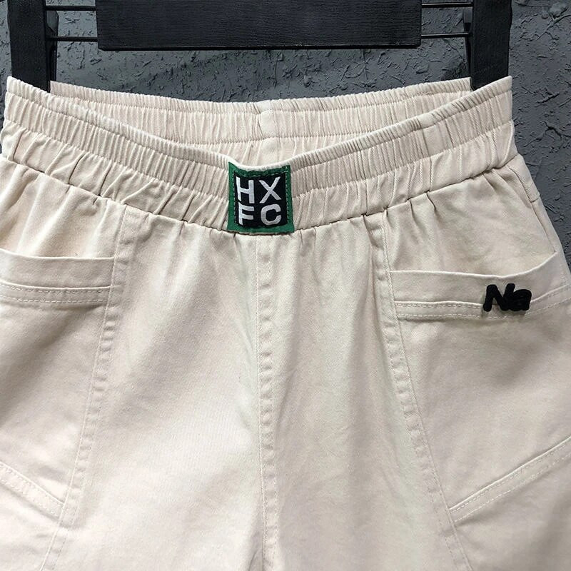 Νέα άφιξη Άνοιξη Καλοκαίρι Κορέα Μόδα Γυναικεία Ελαστική μέση Φαρδιά Λευκό Τζιν Παντελόνι από βαμβακερό τζιν χαρέμι