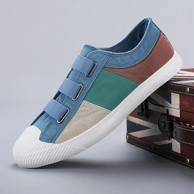 Nove jesenske muške platnene vulkanizirane cipele s elastičnom vrpcom Srednji gornji dio Mješovite boje Mokasinke Prozračne neklizajuće mekane donje ravnine