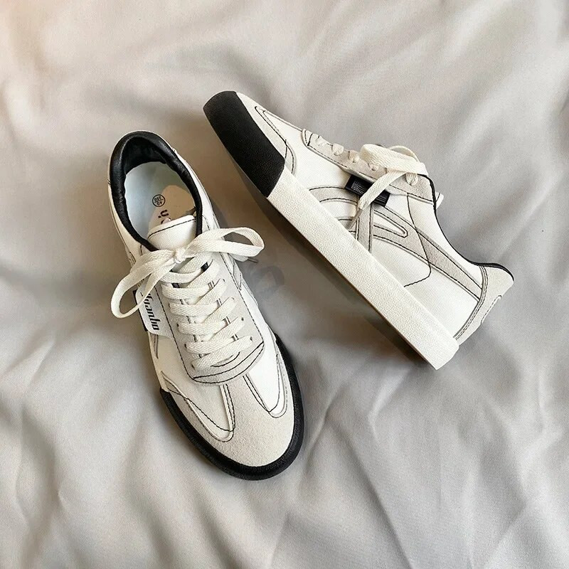 Férfi őszi új vászoncipők Férfi koreai változat Divatos és sokoldalú lapos cipők Puha talpú páros Férfi Deszka Cipők