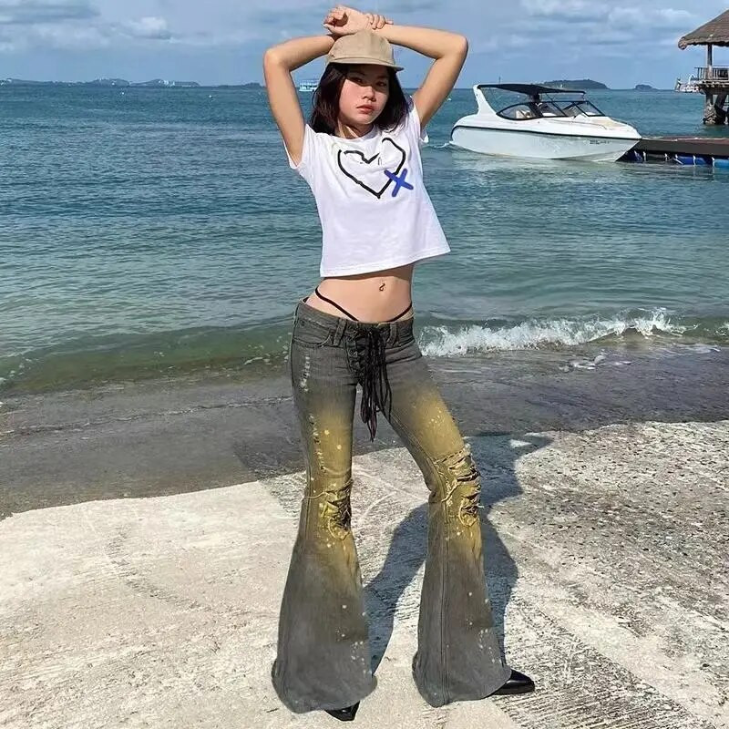 Amerikai Y2K alacsony emelkedésű szexi farmer fűzős dizájn fröccsent tintával szorongatott vintage vékony, sokoldalú népszerű szakadt kiszélesedő nadrág