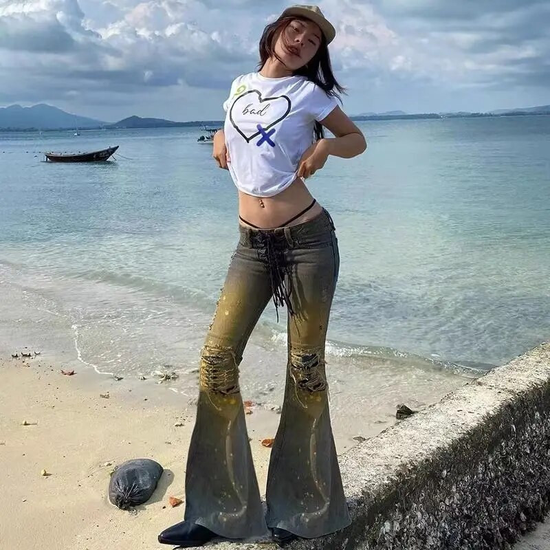 Amerikai Y2K alacsony emelkedésű szexi farmer fűzős dizájn fröccsent tintával szorongatott vintage vékony, sokoldalú népszerű szakadt kiszélesedő nadrág