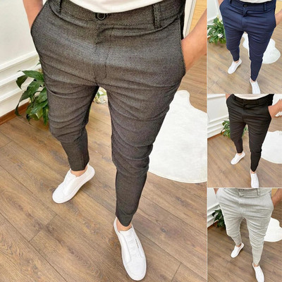 Vīriešu ikdienišķas elastīgas bikses Jaunas vienkrāsainas, slaidas biznesa formāla biroja daudzpusīga intervija vīriešiem ikdienas valkāšanai.