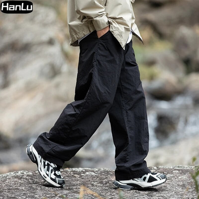Muške proljeće/ljeto nove ravne hlače za ležerne potrebe Ženske tanke plisirane hip hop modne radne hlače