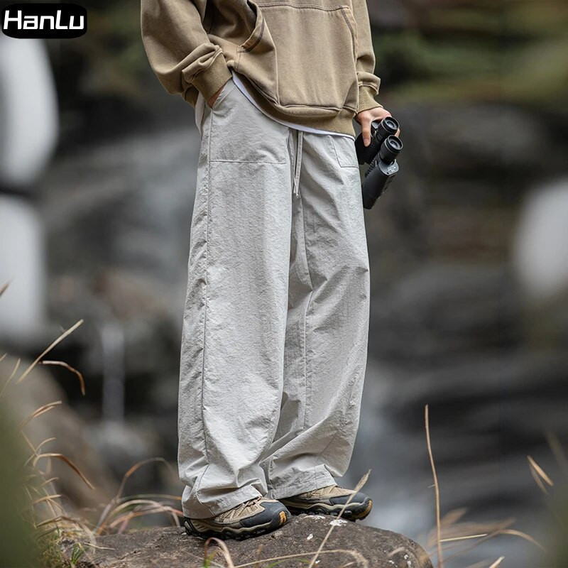 Muške proljeće/ljeto nove ravne hlače za ležerne potrebe Ženske tanke plisirane hip hop modne radne hlače