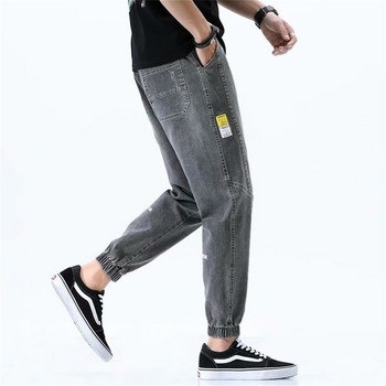 2022 Летни мъжки дънки Jogger Тънки харем панталони Панталони с памучни ленти Корейски стил Светлосин хип-хоп Beam Feet Ежедневни панталони Мъжки
