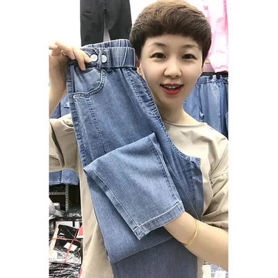 2022 m. vasara Naujoji Korėja mados moterų elastingas juosmuo Laisvos medvilnės džinsinės kelnės Haremas Visiškai suderintos laisvalaikio siuvinėjimo džinsai V959