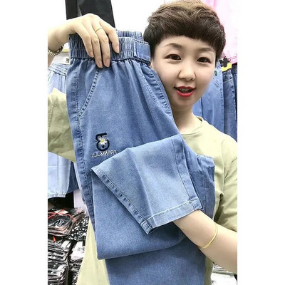 2022 m. vasara Naujoji Korėja mados moterų elastingas juosmuo Laisvos medvilnės džinsinės kelnės Haremas Visiškai suderintos laisvalaikio siuvinėjimo džinsai V959