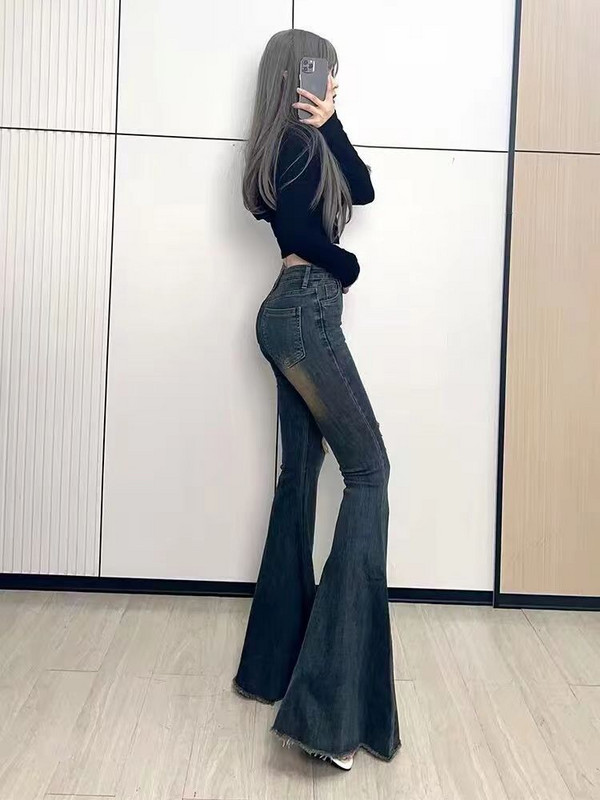 Retró perforált, nagy kitörésű farmernadrág női őszi új divat magas derekú farmer karcsú padló rongyos szélű széles szárú nadrág női