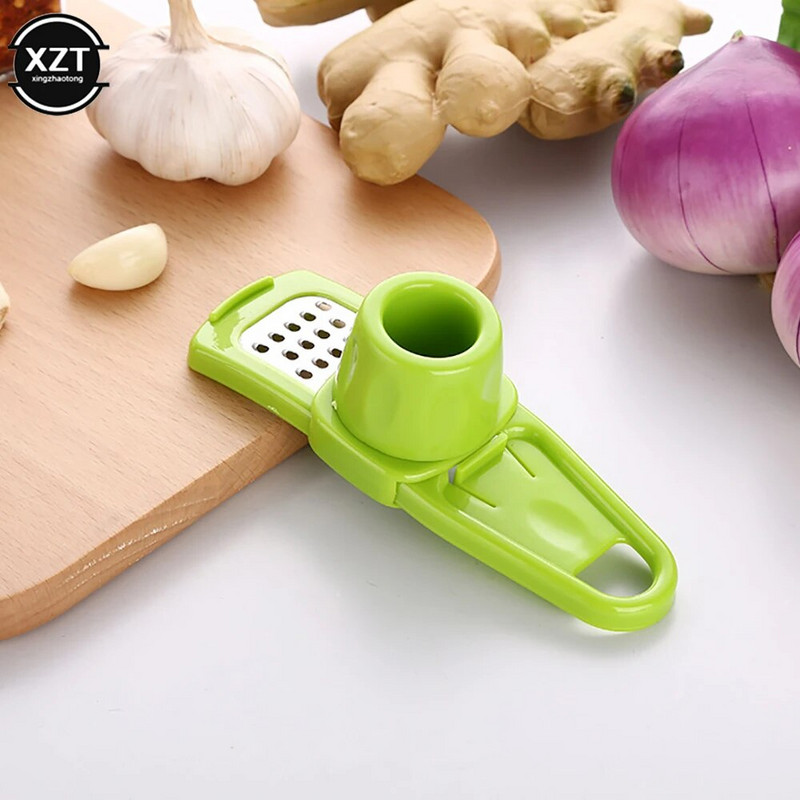 Paprasta česnakų malūnėlis Česnako purvo dirbinys Nerūdijančio plieno česnako trintuvė Daugiafunkcinė česnako preso buitinė maži virtuvės reikmenys