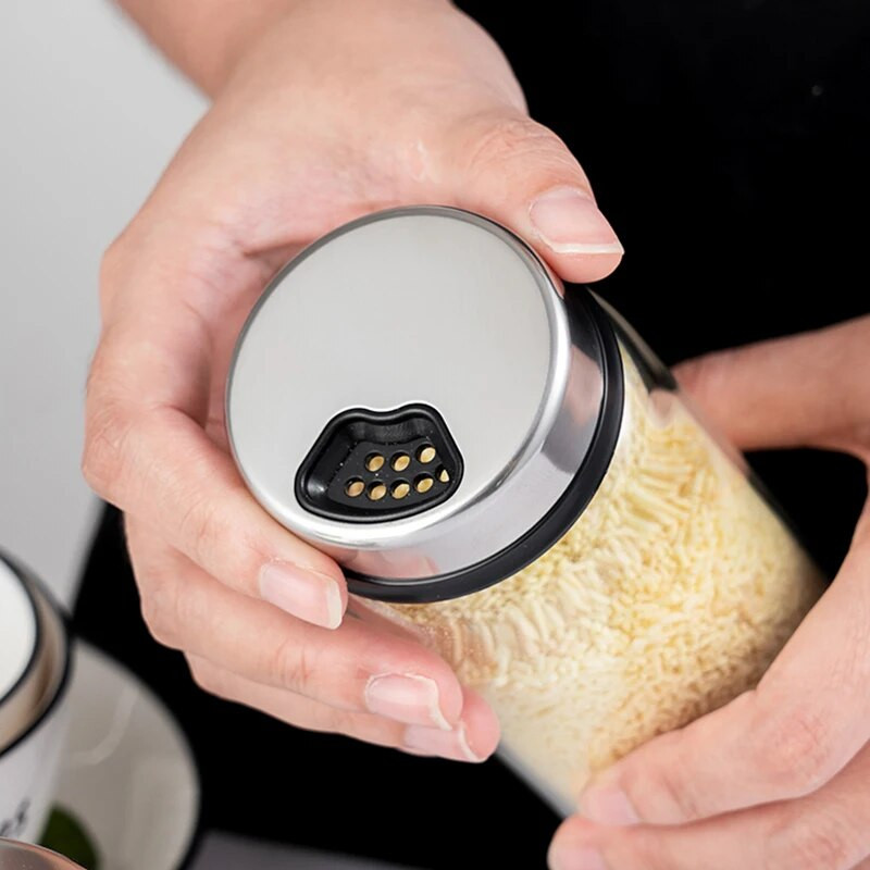 Onlycook kuhinjska posuda za sol i papar Dozator začina s podesivim rupama za izlijevanje, poklopcem od nehrđajućeg čelika i staklenom bocom za roštilj