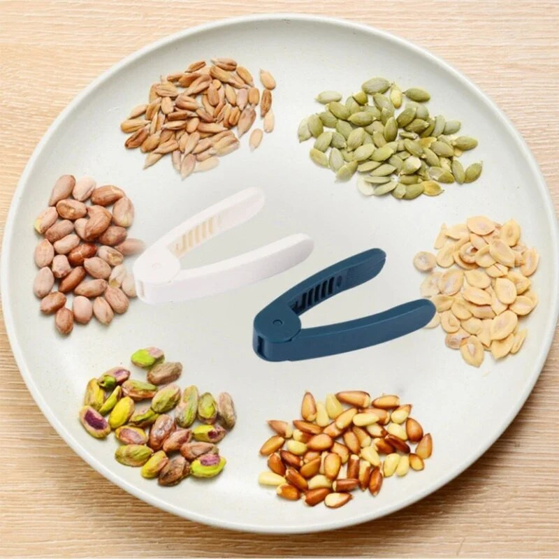 Praktiškas melionų sėklų lukšto paprastas naudojimo vadovas Žemės riešutų lukšto virtuvės įrankis PP medžiaga žemės riešutų lukštams pašalinti