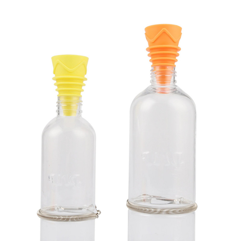 Sisetingimustes kasutatav puuviljakärbsepüünis Välistingimustes kasutatav korduvkasutatav lõks, painduv kummist püüdmislehter, mis sobib enamiku klaaside veinidega, siseruumides kasutatav kärbsepüünis