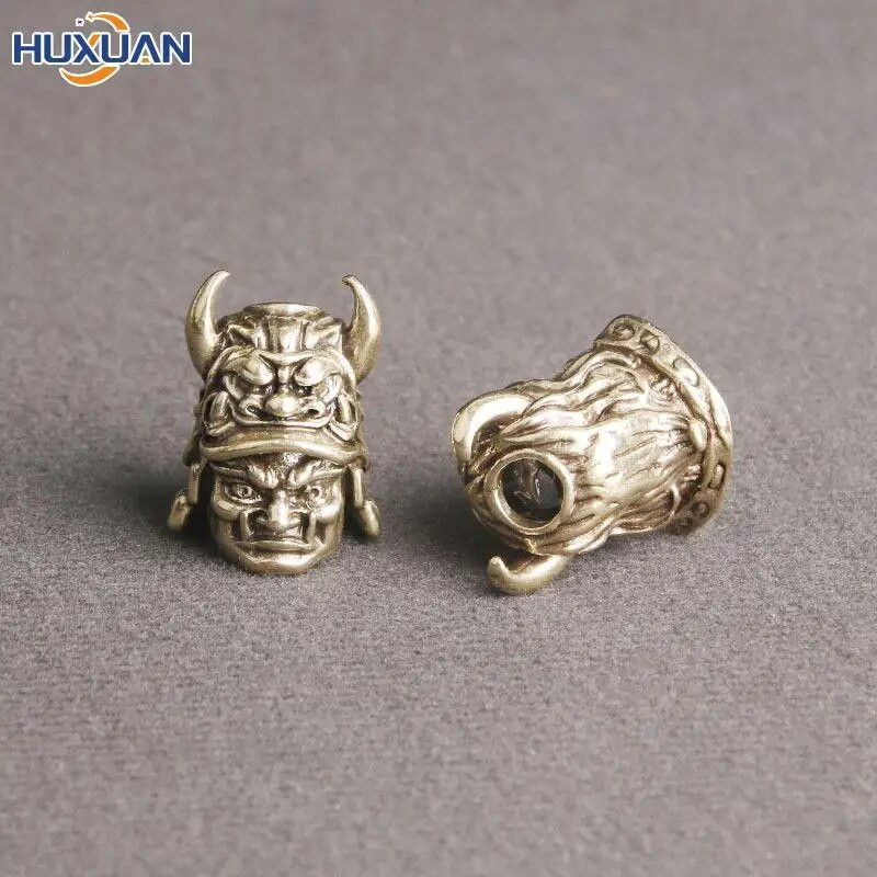 1 vnt žalvario vintažinio samurajų šalmo peilio karoliukai austi virvelių pakabučiai lauko EDC skėčio virvė žalvario „pasidaryk pats“ priedai