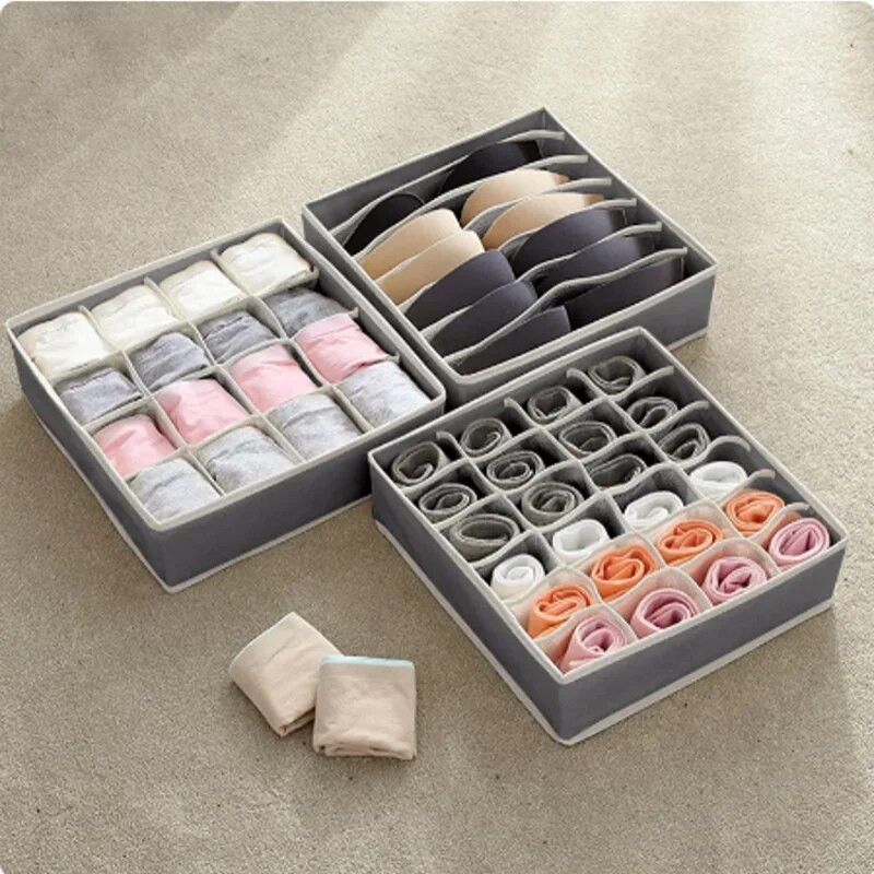 24 grotelės Sulankstomos laikymo dėžutės Spintos tvarkyklės Drabužių organizavimo sistema Stalčių laikikliai Spintelės Kelnės laikymo tvarkyklė