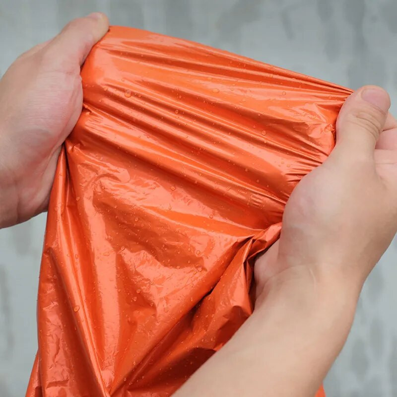 Õues avarii vihmamantel alumiiniumfooliumist tuulekindel pikkade varrukatega mantel Päästev helkurtekk Matkamiseks suured vihmamantlid osad