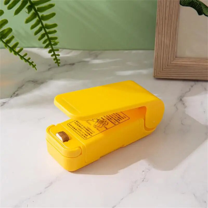 Mini plastikinių maišelių sandarinimo mašina Užkandžių sandarinimas Patogus didmeninis laikymo maišelio gnybtas karšto sandarinimo laikymo mašinos virtuvės prietaisai