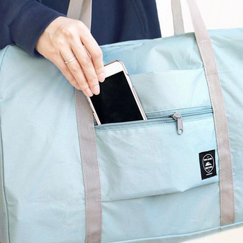 2023 Νέες νάιλον πτυσσόμενες τσάντες ταξιδίου Τσάντα αποθήκευσης ρούχων Μεγάλης χωρητικότητας Αδιάβροχη τσάντα Γυναικείες τσάντες ταξιδιού εξωτερικού χώρου Αδιάβροχες