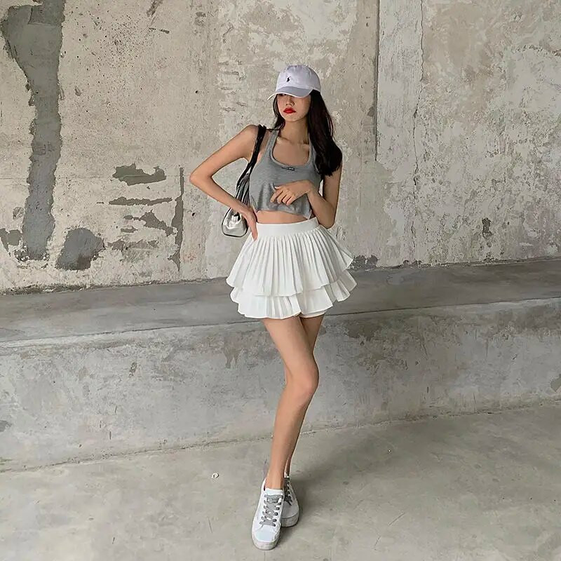 Seksi plisirana mini suknja Ženske suknje visokog struka s volanima Jednobojne crno-bijele boje