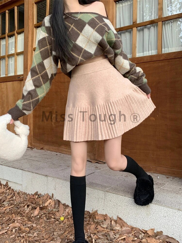 Jesenska slatka pletena suknja Ženska ležerna plisirana Kawaii džemper Mini suknja Ženska jednobojna korejska modna retro suknja princeze 2023.