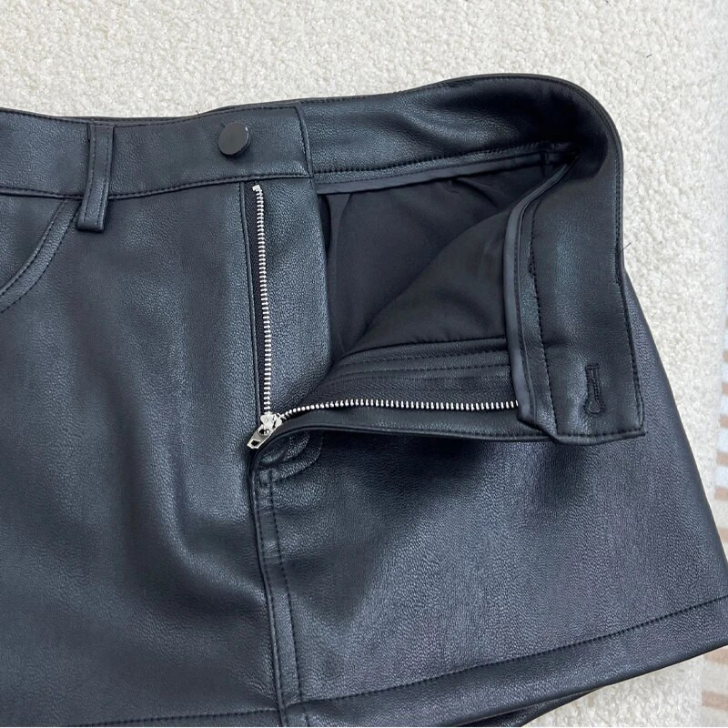 Crna Pu suknja Spice Girl Mini suknja 2023 Nova tekstura visokog struka Suknja na bokovima Kožna suknja Hlače Ženske suknje Duge traf