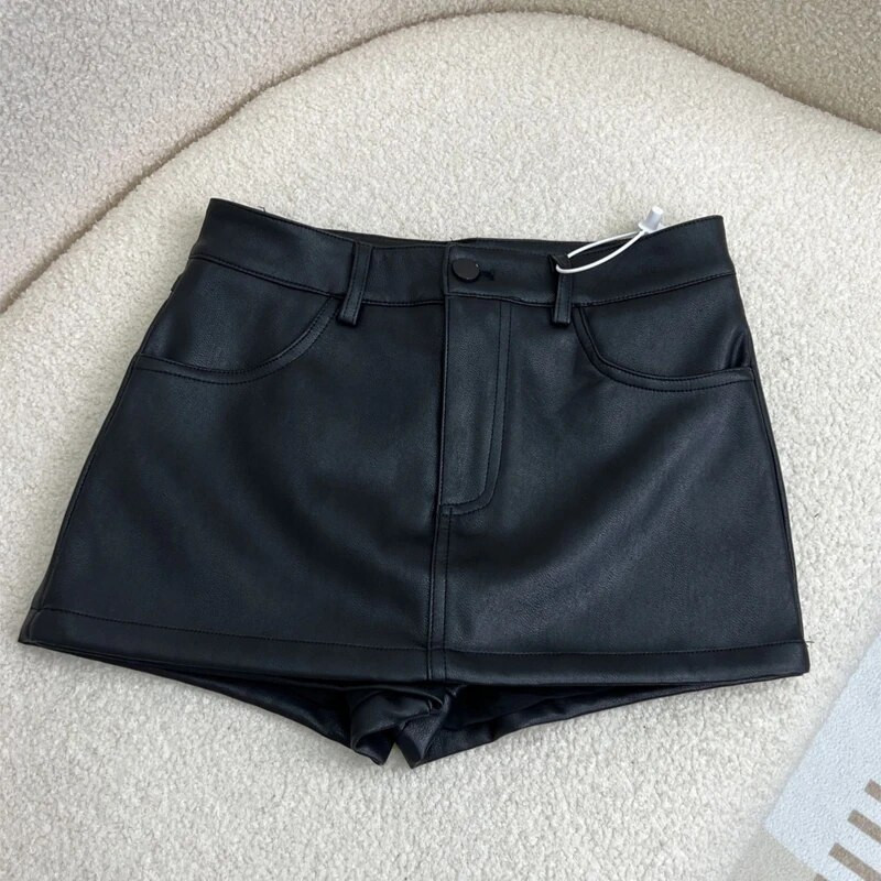 Crna Pu suknja Spice Girl Mini suknja 2023 Nova tekstura visokog struka Suknja na bokovima Kožna suknja Hlače Ženske suknje Duge traf