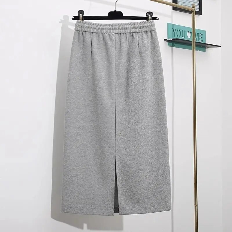 Proljeće i jesen 2023. Jednostavna i moderna svestrana uska ravna polusuknja visokog struka s džepovima na vezanje i pokriva međunožje