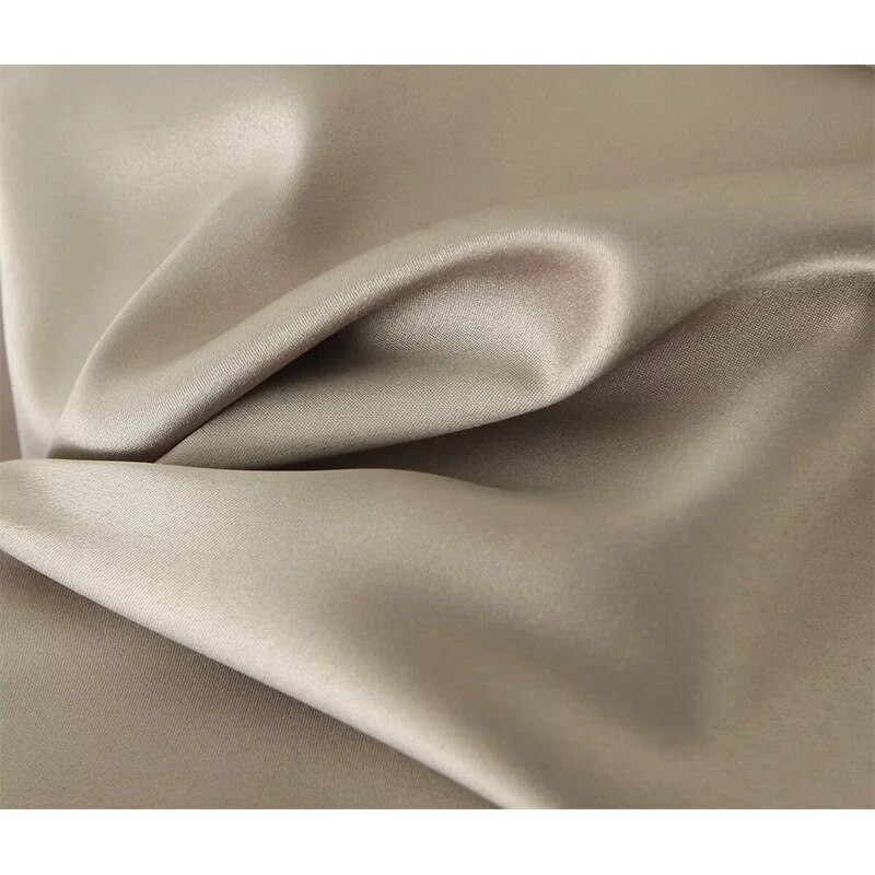 YENKYE új női, elegáns, hollow out alacsony derékú sárgabarack szexi nyári női szoknya szatén midi ceruzaszoknyák