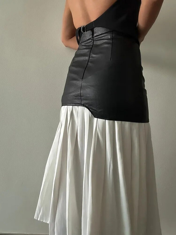 TWOTWINSTYLE Colorblock Patchwork kožna suknja a kroja za žene Visokog struka Spojene plisirane suknje temperamentnog kroja Ženske
