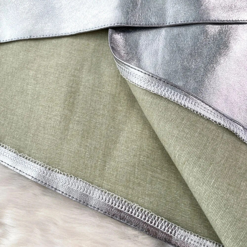 Ženska šik jednobojna PU asimetrična podijeljena kratka suknja visokog struka Elegantna korejska modna suknja s omotom slatka ljetna odjeća