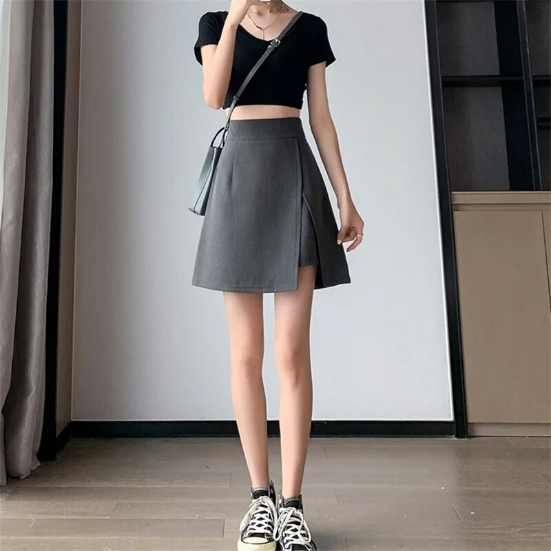 Sieviešu A-līnijas mini svārki ar augstu vidukli neregulāri sadalīti pussvārki meitenēm lielizmēra tievēšanai pelēki melni drošības šorti Īsa kleita