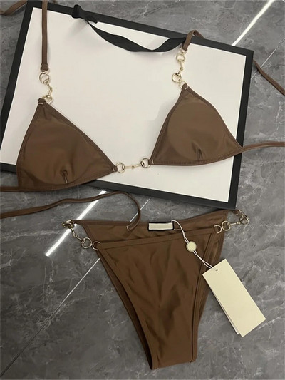 Διάσημες γυναικείες κοστούμι μπικίνι Καλοκαιρινό γυναικείο πάρτι Μόδα σέξι ραφές με αλυσίδα γαλλικό σουτιέν & δεμένα σλιπ